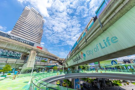 Bangkok city view of Siam Discovery and MBK Center point colorful and popular travel location green sky walk with tourist around the world. 13 September 2018. Bangkok, Thailand.のeditorial素材