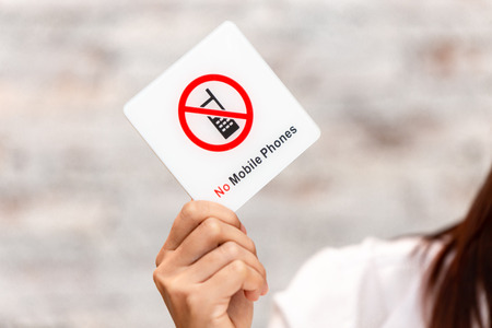 no mobile phone or phone call warning prohibit signの写真素材