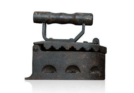 vintage old clothes charcoal iron forging presses isolated on white background