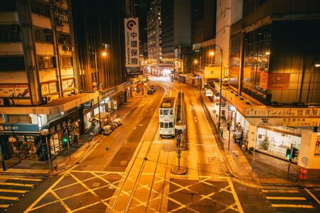 Night road at Central district Hong Kong city street view with traditional style tram public transport. 24 November 2017, Hongkong.のeditorial素材