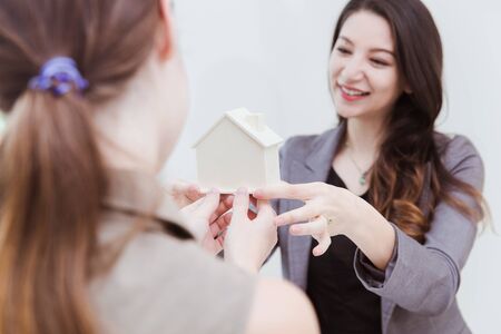 Home selling agency present offer new house to buyer for making decision with loan offers low interest rates mortgageの写真素材