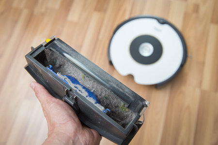 a lot of dirty dust in dust bin from robot vacuum cleaner home cleaning protect from dust allergiesの写真素材