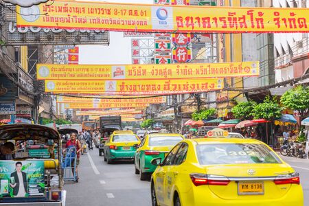 Vegetarian Festival (J Festival) In Thailand at Yaowarat or Bangkok China town street decoration with yellow flag for No animal meat food sign. 10 October 2018. Bangkok, THAILAND.のeditorial素材
