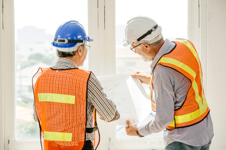 Happy professional worker working together home builder architecture mix race in construction site