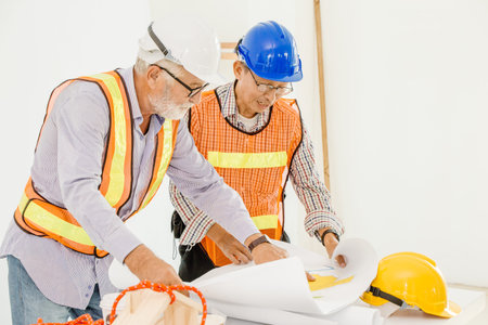 Happy professional worker working together home builder architecture mix race in construction site