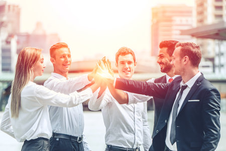 business people working together join hand for good teamwork for company