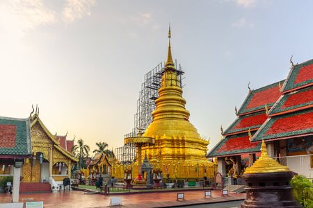 Beautiful sunset view of Wat Phra That Hariphunchai is a Buddhist temple travel place in Lamphun, Thailand. 22 August 2019.のeditorial素材