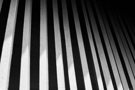black and white art photography shadow of pattern interior line contrast light and shade of wooden windows.の写真素材