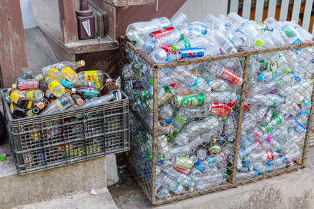Used aluminium Can and drinking water plastic bottle garbage waste collected sale for recycle in...