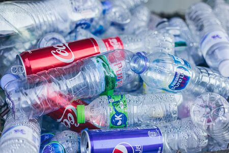 Used aluminium Can and drinking water plastic bottle garbage waste collected sale for recycle in Thailand. 31 January 2019.のeditorial素材