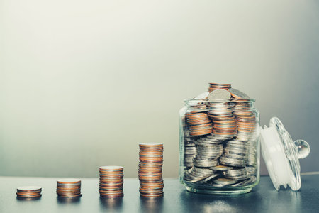 Coins income saving collected in jar with money stack step growing growth saving money, Personal...