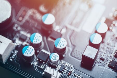Solid capacitor on printed circuit board on computer mother board.の写真素材