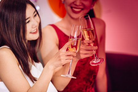 Girl victim drinking alcohol, women in danger situation from drunk smashed girl in the party concept.の写真素材
