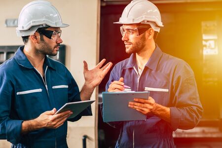 supervisor engineering team working together in heavy industry, check the machine maintenance and service.の写真素材