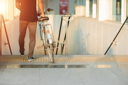 modern lifestyle of urban people using bring bicycles go with subway underground train station in car free day.の写真素材