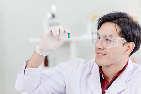 Scientist Doctor found new drug medical innovation to cure disease and anti virus in hospital conceptの写真素材