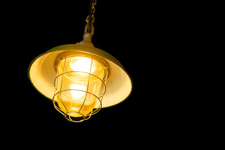 ceiling hanging light lamp isolated on black background