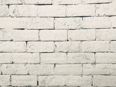 White stone brick wall vintage color tone for building wallpaper or texture background.