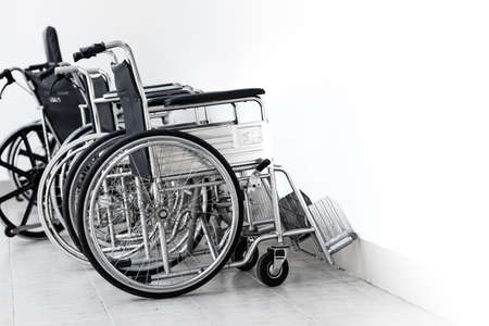 Wheelchair, a chair with wheels for disability people and hospital illness injury patient care.の写真素材