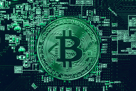 digital money bitcoin cryptocurrency coin on electicity computer computer circuit board color tone.の写真素材