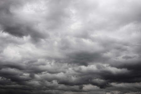 dark cloud rainy season storm gloomy from high depression darkness cover the sky looks scary.の写真素材