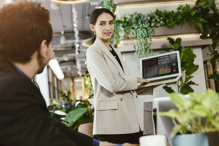 Smart women happy presentation her or report work represent with male teamwork in modern office.
