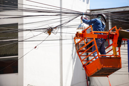 Non safety equipment technician risk working to fix repair and manage messy electricity and...