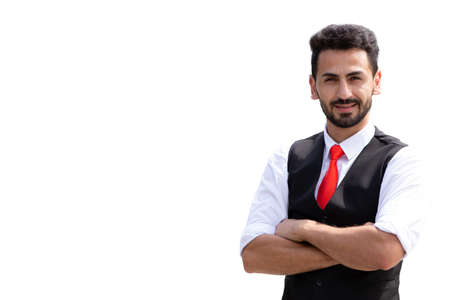 Hispanic businessman male standing smile arm fold confident isolated on white backgroundの写真素材