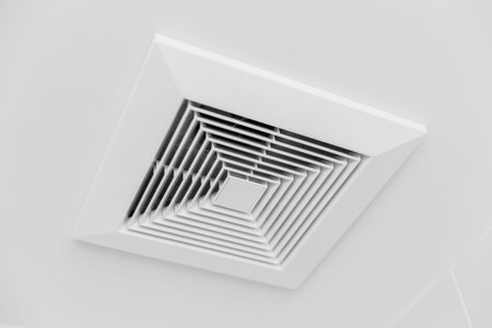 Closeup clean new Ceiling Air Duct air vent flow in office room