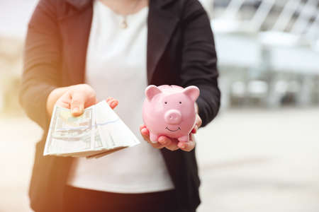 saving money get rich and wealth with piggy bank personal account financial conceptの写真素材