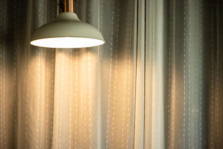 home lamp lighting decoration with blank curtain space for interior backgroundの写真素材