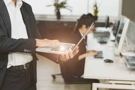 manager touch laptop computer over office business employee for monitor and command control company...
