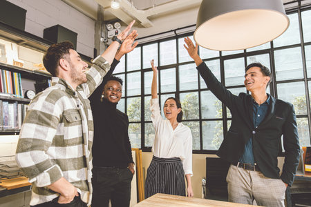 group of business office employee mix race cheerful glad raising hand together for successful finish project done conceptの写真素材