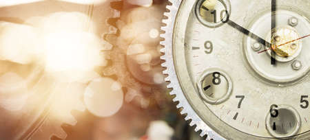 Engineering Heavy Industry Time Clock Cog Wheel Gears work hours concept with space for textの写真素材