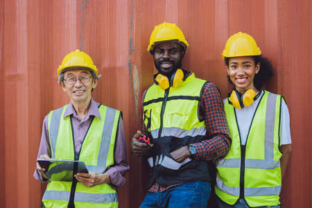 group of worker people mix gender race young and elder aged standing smiling together.の写真素材