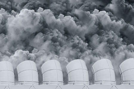 air ventilator cooling tower chimney with dirty smoke dust emission for air pollution industry concept.の写真素材