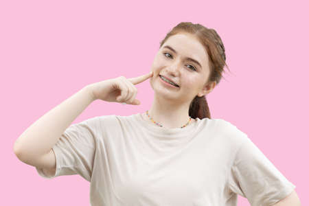 american teen cute lovely portrait dental care with facial skin spot happy smileの写真素材