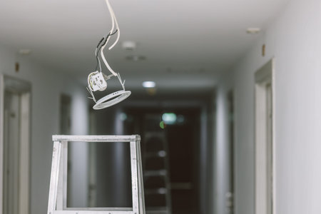 install replace fix or repair ceiling down lights bulb danger area with electrical shock concept.