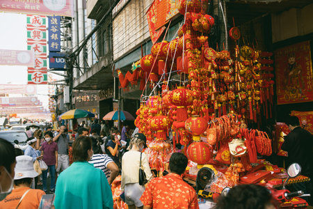 Yaowarat street during Chinese New Year festival celebrates holidays in Chinese culture shop sale red china traditional lantern clothes: 19 January 2023, Bangkok, THAILAND.のeditorial素材