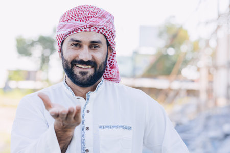 Arab male hand rise open palm for asking help share giving or donation concept happy smile