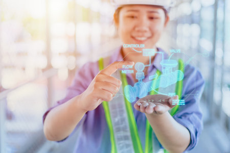 engineer working with modern technology hologram graphic 3d pipe design model overlay in hand palm