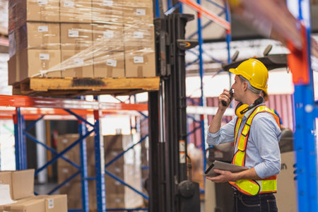 Factory Warehouse Worker Working Operate Loading Cargo In Shipping Area Inventory Control Foreman.