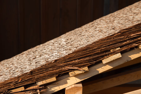 Closeup Hiwada buki roofing style traditional Japanese made from cedar or cypress layers bark...