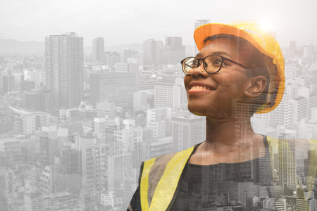 Happy success black african women young engineer worker overlay modern city metro for civil engineering development vision conceptの写真素材