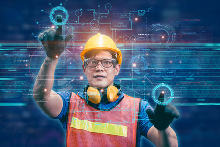 engineer male happy using modern advance technology display touch screen hologram graphic interface control operate machine factory industryの写真素材