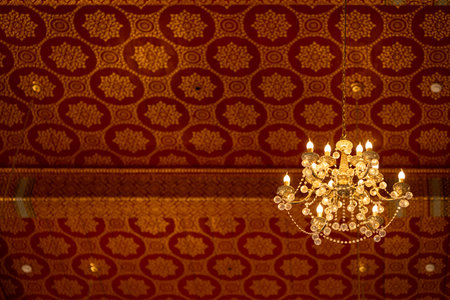 Thai temple ceiling interior Chandelier with hand drawing pattern most exquisite beauty meticulous craftsmanship stunningly beautiful.の写真素材