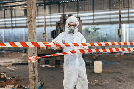 Toxic chemical gas leak safety team working closed area in danger factory workshop environment contamination safety and protectionの写真素材
