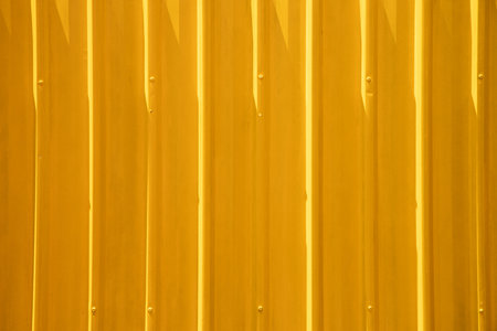 Yellow Stripe steel metal sheet for cargo container line industry wall texture pattern for background.の写真素材