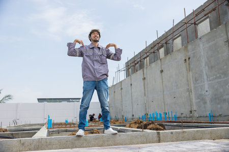 Radio Taiso, Japanese engineer worker doing calisthenics stretching dance before start working in...