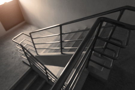 Fire exit staircase down way for emergency escape from building in case of fireの写真素材